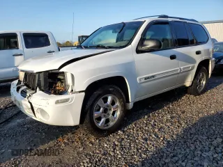 2003 GMC Envoy SLE with VIN 1GKDS13S532369187, listed as a Copart auction lot 79922934 with 223,997 mi miles and Salvage Title. Bid and sale history available at carsss.com. Image 1.