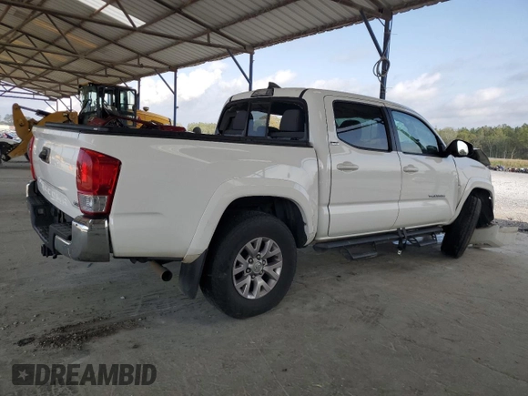2016 Toyota Tacoma SR with VIN 5TFCZ5AN9GX014233, listed as a Copart auction lot 52016485 with 260,017 mi miles and Salvage Title. Bid and sale history available at carsss.com. Image 3.