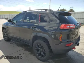 2014 Jeep Cherokee Trailhawk z VIN 1C4PJMBS1EW239692, wystawiony jako Copart lot #57153065 z przebiegiem 111 899 mil mil oraz Szkoda całkowita • Salvage title. Historia ofert i sprzedaży dostępna na DreamBid. Obrazek 2.