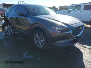 2021 Mazda CX-30 Select z VIN 3MVDMABL0MM220307, wystawiony jako IAAI lot #41336136 z przebiegiem 62 155 mil mil oraz . Historia ofert i sprzedaży dostępna na DreamBid. Obrazek 1.