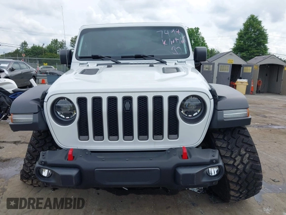 2021 Jeep Wrangler Unlimited Rubicon with VIN 1C4HJXFG7MW527498, listed as a IAAI auction lot 42393520 with 18,085 mi miles and . Bid and sale history available at DreamBid. Image 12.