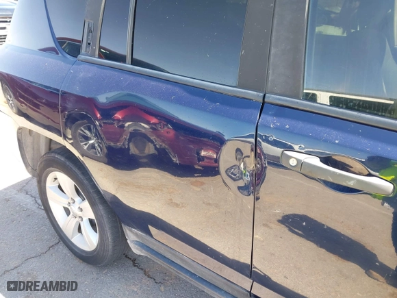 2014 Jeep Compass Sport with VIN 1C4NJCBB2ED737297, listed as a IAAI auction lot 42056598 with 185,155 mi miles. Bid and sale history available at carsss.com. Image 6.