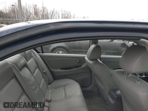 2003 Nissan Maxima GLE z VIN JN1DA31A03T412514, wystawiony jako IAAI lot #41856102 z przebiegiem 156 832 mil mil oraz . Historia ofert i sprzedaży dostępna na DreamBid. Obrazek 8.