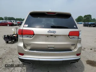 2014 Jeep Grand Cherokee Summit с VIN 1C4RJFJGXEC436797, выставлен на аукционе Copart как лот 60248595 с пробегом 156 395 миль миль и Списание • Salvage title. История ставок и продаж доступна на DreamBid. Изображение 6.