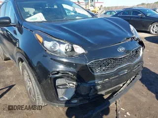 2020 Kia Sportage LX with VIN KNDPM3ACXL7808431, listed as a IAAI auction lot 41614114 with 123,400 mi miles. Bid and sale history available at carsss.com. Image 6.