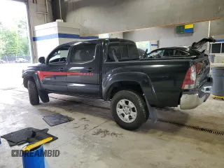 2010 Toyota Tacoma PreRunner with VIN 3TMJU4GN3AM097601, listed as a Copart auction lot 57703415 with 227,978 mi miles and Salvage title. Bid and sale history available at DreamBid. Image 2.