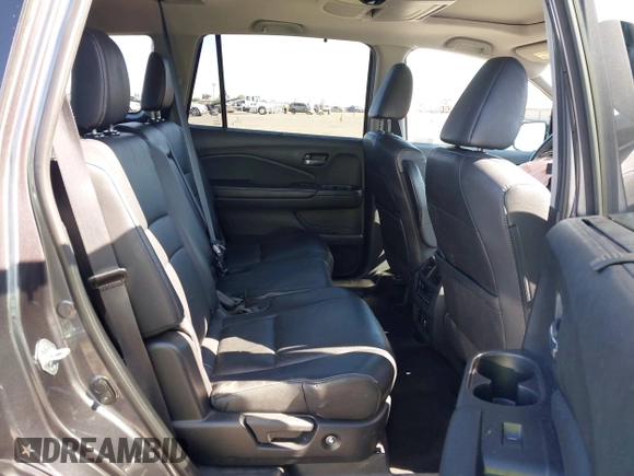 2021 Honda Pilot Touring 8-Passenger with VIN 5FNYF6H97MB034399, listed as a IAAI auction lot 42303419 with 50,034 mi miles and . Bid and sale history available at DreamBid. Image 8.