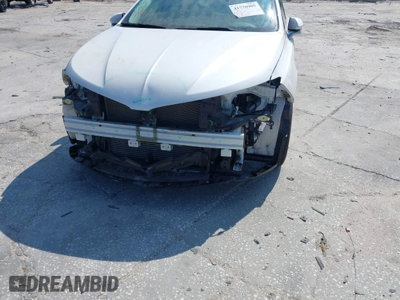 2014 Lincoln MKZ with VIN 3LN6L2G91ER832211, listed as a IAAI auction lot 41770905 with 63,417 mi miles and . Bid and sale history available at DreamBid. Image 6.