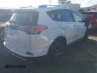 2016 Toyota RAV4 SE with VIN JTMNFREV3GJ070562, listed as a IAAI auction lot 41246655 with 89,174 mi miles and . Bid and sale history available at DreamBid. Image 4.