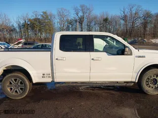 2015 Ford F-150 XLT w/HD Payload Pkg with VIN 1FTFW1EF6FFC66723, listed as a IAAI auction lot 41303476 with 203,999 mi miles. Bid and sale history available at carsss.com. Image 13.