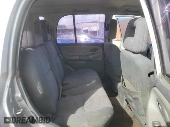 2003 Chevrolet Tracker with VIN 2CNBE13C836953178, listed as a Copart auction lot 60715605 with 128,978 mi miles and Salvage title. Bid and sale history available at DreamBid. Image 11.