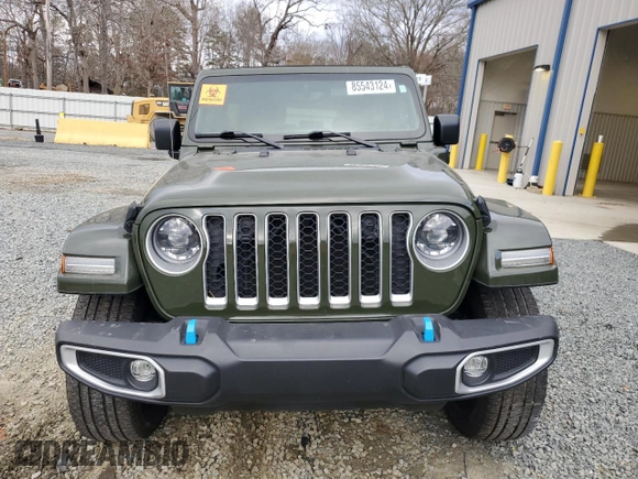 2023 Jeep Wrangler Sahara with VIN 1C4JJXP62PW553101, listed as a Copart auction lot 85543124 with 28,157 mi miles and Salvage Title. Bid and sale history available at DreamBid. Image 5.