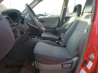 2003 Chevrolet Tracker z VIN 2CNBE13CX36943395, wystawiony jako Copart lot #70964574 z przebiegiem 118 975 mil mil oraz Szkody całkowita. Historia ofert i sprzedaży dostępna na DreamBid. Obrazek 7.