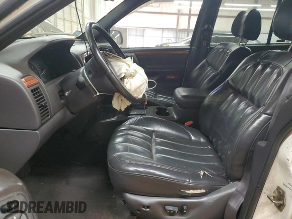 1999 Jeep Grand Cherokee Limited с VIN 1J4GW68S8XC627893, выставлен на аукционе Copart как лот 53284365 с пробегом 233 996 миль миль и Списание • Salvage title. История ставок и продаж доступна на DreamBid. Изображение 7.