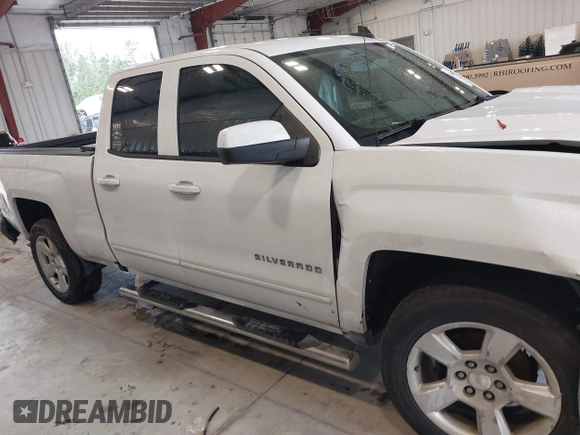 2018 Chevrolet Silverado 1500 LT with VIN 1GCRCREC0JZ204834, listed as a IAAI auction lot 41363579 with 135,247 mi miles and . Bid and sale history available at DreamBid. Image 13.