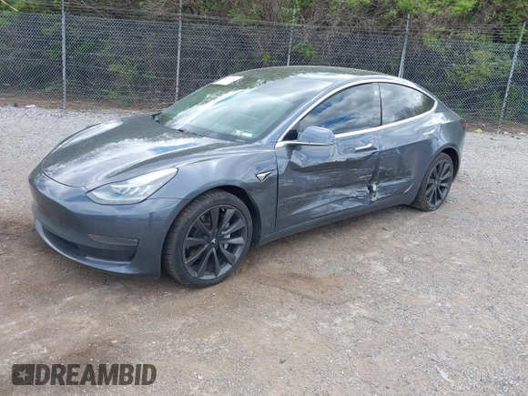 2020 Tesla Model 3 Long Range with VIN 5YJ3E1EB2LF646449, listed as a IAAI auction lot 42059086 with 120,981 mi miles and . Bid and sale history available at DreamBid. Image 2.