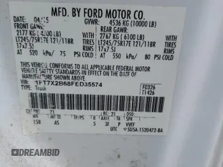 2015 Ford F-250 XLT with VIN 1FT7X2B68FED35574, listed as a Copart auction lot 53776475 with 170,591 mi miles and Salvage Title. Bid and sale history available at DreamBid. Image 12.