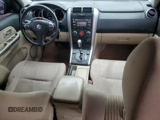 2013 Suzuki Grand Vitara z VIN JS3TE0D44D4100033, wystawiony jako Copart lot #51648665 z przebiegiem 151 879 mil mil oraz Czysty tytuł • Clean title. Historia ofert i sprzedaży dostępna na DreamBid. Obrazek 8.