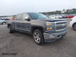 2014 Chevrolet Silverado 1500 LTZ with VIN 3GCUKSEC4EG384636, listed as a IAAI auction lot 41352484 with 153,976 mi miles. Bid and sale history available at carsss.com. Image 1.