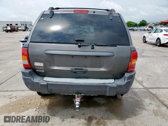 2003 Jeep Grand Cherokee Laredo with VIN 1J4GW48SX3C569087, listed as a Copart auction lot 55941035 with Not provided miles and Salvage title. Bid and sale history available at DreamBid. Image 6.