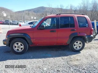 2005 Jeep Liberty Sport with VIN 1J4GL48K35W645419, listed as a IAAI auction lot 41823845 with 168,896 mi miles. Bid and sale history available at carsss.com. Image 14.
