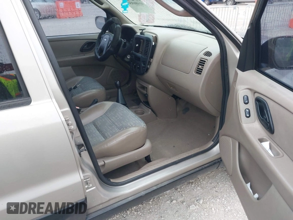 2001 Ford Escape with VIN 1FMUU01B61KE00524, listed as a IAAI auction lot 41486950 with 163,753 mi miles and . Bid and sale history available at DreamBid. Image 5.