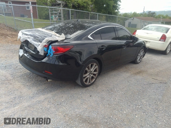2015 Mazda 6 i Grand Touring with VIN JM1GJ1W68F1168078, listed as a IAAI auction lot 42149519 with 127,641 mi miles and . Bid and sale history available at DreamBid. Image 4.