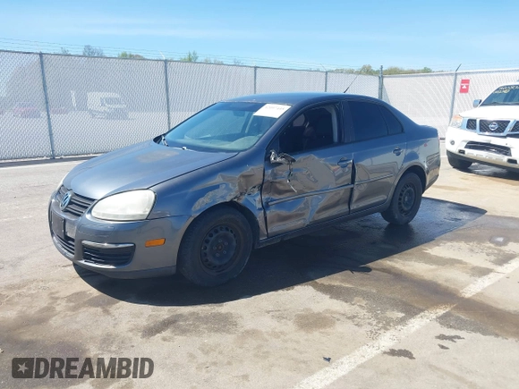 2009 Volkswagen Jetta S with VIN 3VWJZ71K49M075892, listed as a IAAI auction lot 42097445 with 218,016 mi miles and . Bid and sale history available at DreamBid. Image 2.