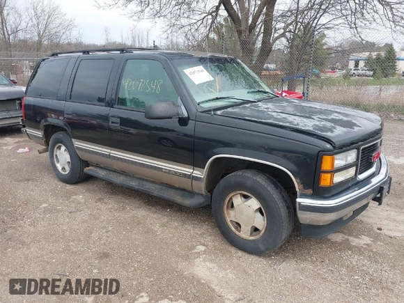 1998 GMC Yukon with VIN 1GKEK13R9WJ734112, listed as a IAAI auction lot 42072548 with 226,061 mi miles. Bid and sale history available at carsss.com. Image 1.