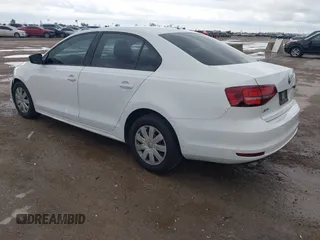 2016 Volkswagen Jetta Sedan 1.4T S w/Technology with VIN 3VW267AJ0GM311469, listed as a IAAI auction lot 41914668 with 83,223 mi miles. Bid and sale history available at carsss.com. Image 3.