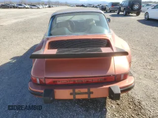 1974 Porsche 911 with VIN 9114111882, listed as a Copart auction lot 47080465 with 4,828 mi miles and Salvage title. Bid and sale history available at DreamBid. Image 6.