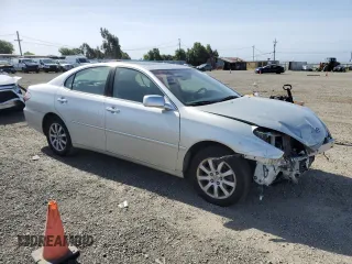 2002 Lexus ES 300 with VIN JTHBF30G920050886, listed as a Copart auction lot 57087355 with 131,304 mi miles and Salvage title. Bid and sale history available at DreamBid. Image 4.