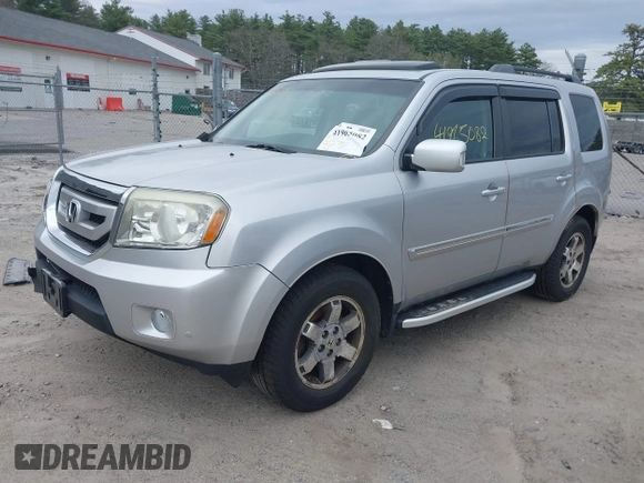 2011 Honda Pilot Touring with VIN 5FNYF4H90BB022354, listed as a IAAI auction lot 41965082 with 126,505 mi miles and . Bid and sale history available at carsss.com. Image 18.