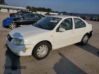 1999 Volkswagen Jetta GL z VIN 3VWRA29M5XM058261, wystawiony jako Copart lot #74589844 z przebiegiem 167 384 mil mil oraz Szkoda całkowita • Salvage title. Historia ofert i sprzedaży dostępna na DreamBid. Obrazek 1.
