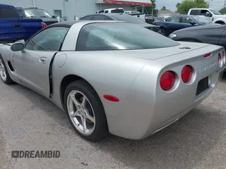 2004 Chevrolet Corvette with VIN 1G1YY22G645132408, listed as a IAAI auction lot 42110641 with 32,707 mi miles and . Bid and sale history available at DreamBid. Image 3.