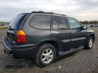 2004 GMC Envoy SLT z VIN 1GKDT13S042406662, wystawiony jako Copart lot #50523855 z przebiegiem 62 122 mil mil oraz Czysty tytuł • Clean title. Historia ofert i sprzedaży dostępna na DreamBid. Obrazek 3.
