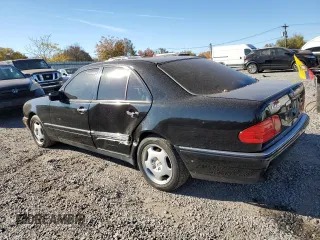 1997 Mercedes-Benz E-Class with VIN WDBJF72F0VA523161, listed as a Copart auction lot 77752804 with 143,495 mi miles and Salvage Title. Bid and sale history available at carsss.com. Image 2.