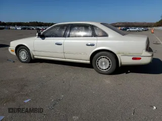 1994 Infiniti Q45 z VIN JNKNG01D3RM252218, wystawiony jako Copart lot #77230944 z przebiegiem 69 069 mil mil oraz Tytuł czysty. Historia ofert i sprzedaży dostępna na DreamBid. Obrazek 2.