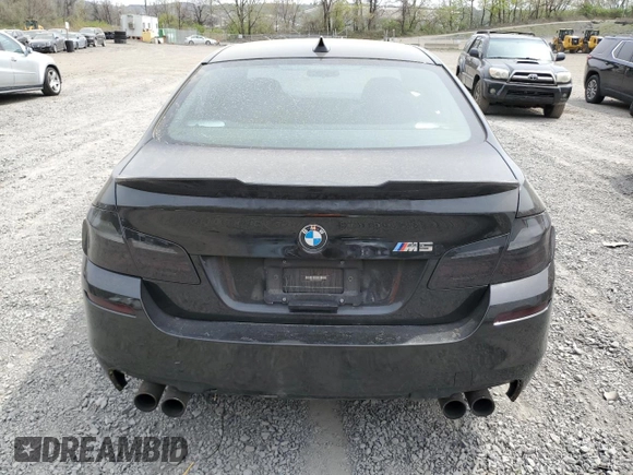 2013 BMW M5 z VIN WBSFV9C54DD095421, wystawiony jako Copart lot #53492515 z przebiegiem Nie podano mil oraz Szkoda całkowita • Salvage title. Historia ofert i sprzedaży dostępna na DreamBid. Obrazek 6.