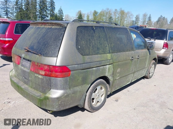 2000 Honda Odyssey EX with VIN 2HKRL1863YH008265, listed as a IAAI auction lot 42041096 with 157,694 mi miles and . Bid and sale history available at DreamBid. Image 4.