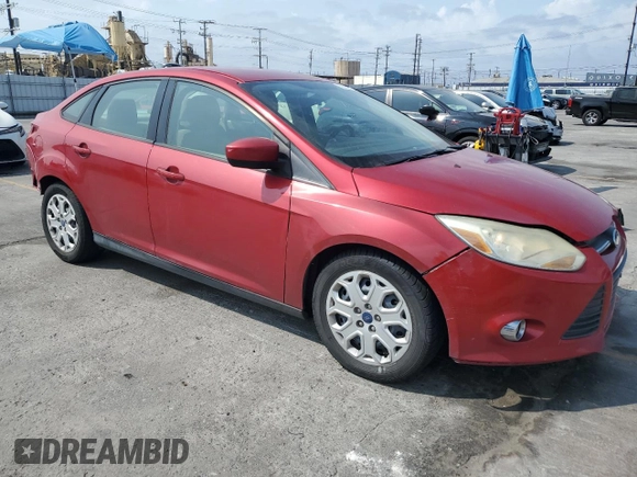 2012 Ford Focus SE with VIN 1FAHP3F28CL431445, listed as a Copart auction lot 59562595 with 152,842 mi miles and Salvage title. Bid and sale history available at DreamBid. Image 4.