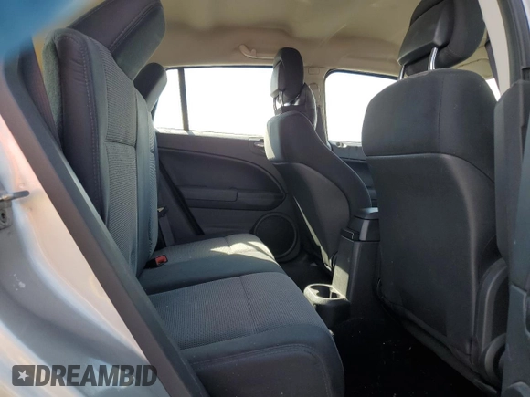 2010 Dodge Caliber SXT z VIN 1B3CB4HA4AD597158, wystawiony jako Copart lot #51757335 z przebiegiem 128 791 mil mil oraz Czysty tytuł • Clean title. Historia ofert i sprzedaży dostępna na DreamBid. Obrazek 10.
