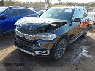 2016 BMW X5 xDrive35i with VIN 5UXKR0C54G0U11822, listed as a IAAI auction lot 41909821 with 149,460 mi miles. Bid and sale history available at carsss.com. Image 2.