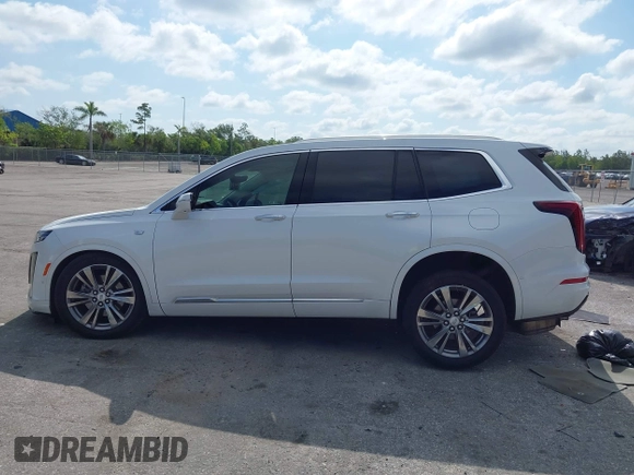 2023 Cadillac XT6 FWD Premium Luxury with VIN 1GYKPCRS3PZ186210, listed as a IAAI auction lot 42290027 with 44,117 mi miles and . Bid and sale history available at DreamBid. Image 14.