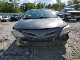 2011 Toyota Corolla L with VIN 2T1BU4EE8BC698357, listed as a Copart auction lot 52917175 with 182,519 mi miles and Clean Title. Bid and sale history available at carsss.com. Image 5.