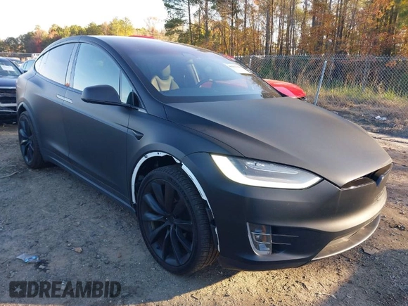 2020 Tesla Model X Long Range with VIN 5YJXCDE28LF298553, listed as a IAAI auction lot 40863184 with 54,031 mi miles and . Bid and sale history available at DreamBid. Image 1.