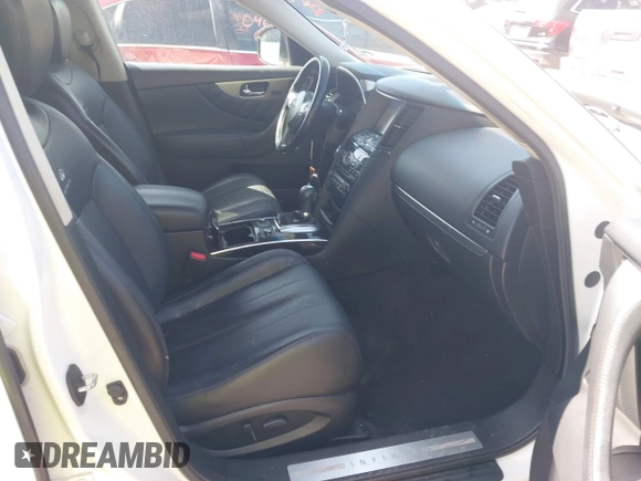2014 Infiniti QX70 with VIN JN8CS1MW7EM413033, listed as a IAAI auction lot 41993136 with 148,838 mi miles and . Bid and sale history available at DreamBid. Image 5.