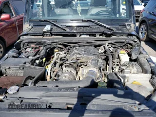 2015 Jeep Wrangler Unlimited Freedom with VIN 1C4BJWDG8FL689194, listed as a Copart auction lot 58016385 with 108,026 mi miles and Salvage title. Bid and sale history available at DreamBid. Image 11.