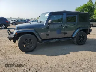 2008 Jeep Wrangler Unlimited Sahara z VIN 1J8GA59108L633332, wystawiony jako Copart lot #64613375 z przebiegiem 191 918 mil mil oraz Czysty tytuł • Clean title. Historia ofert i sprzedaży dostępna na DreamBid. Obrazek 1.