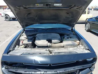 2019 Dodge Challenger SXT z VIN 2C3CDZAG1KH587281, wystawiony jako IAAI lot #42180057 z przebiegiem 109 333 mil mil oraz . Historia ofert i sprzedaży dostępna na DreamBid. Obrazek 10.